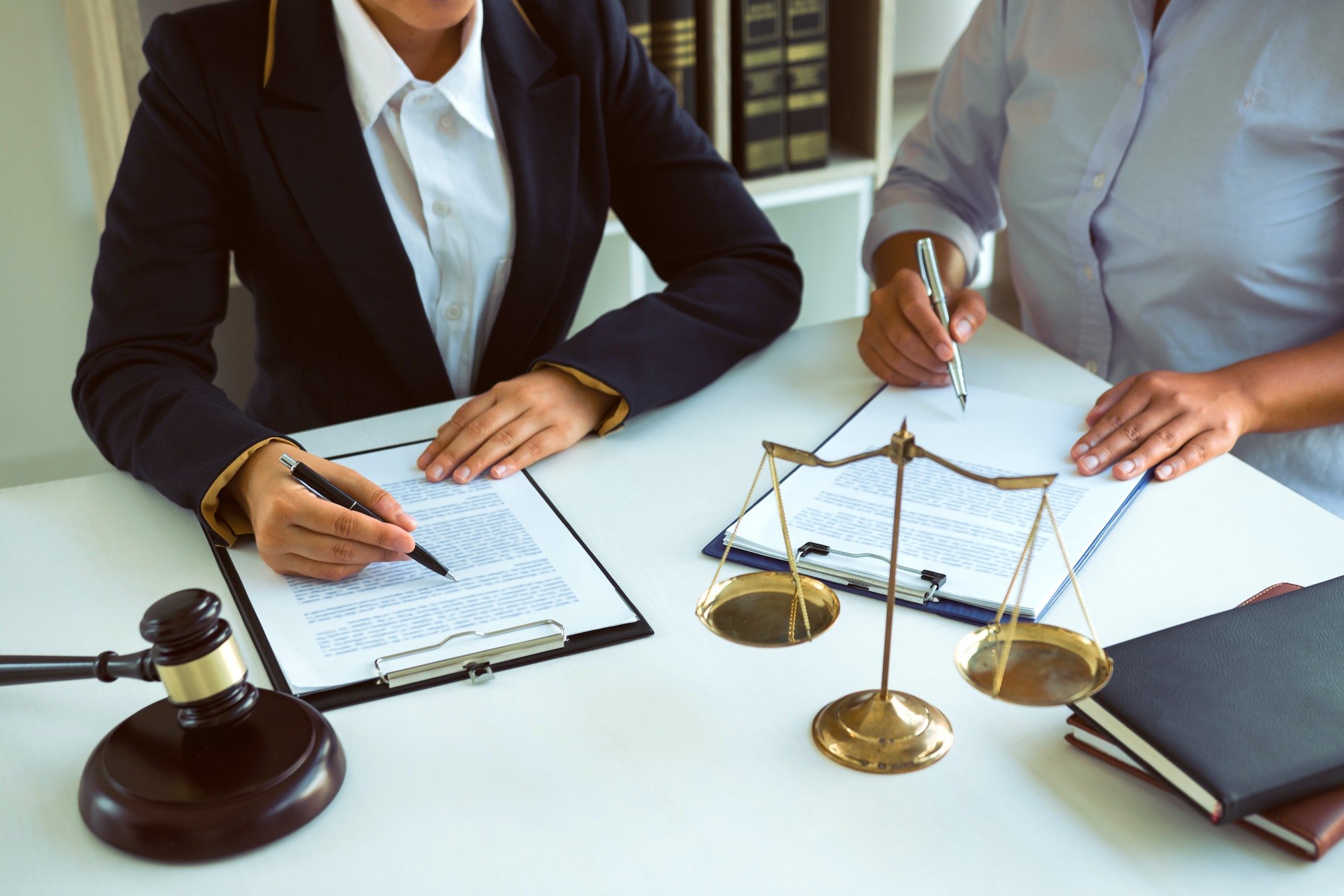 Business lawyer is currently counseling the client's trial at the lawyer office.